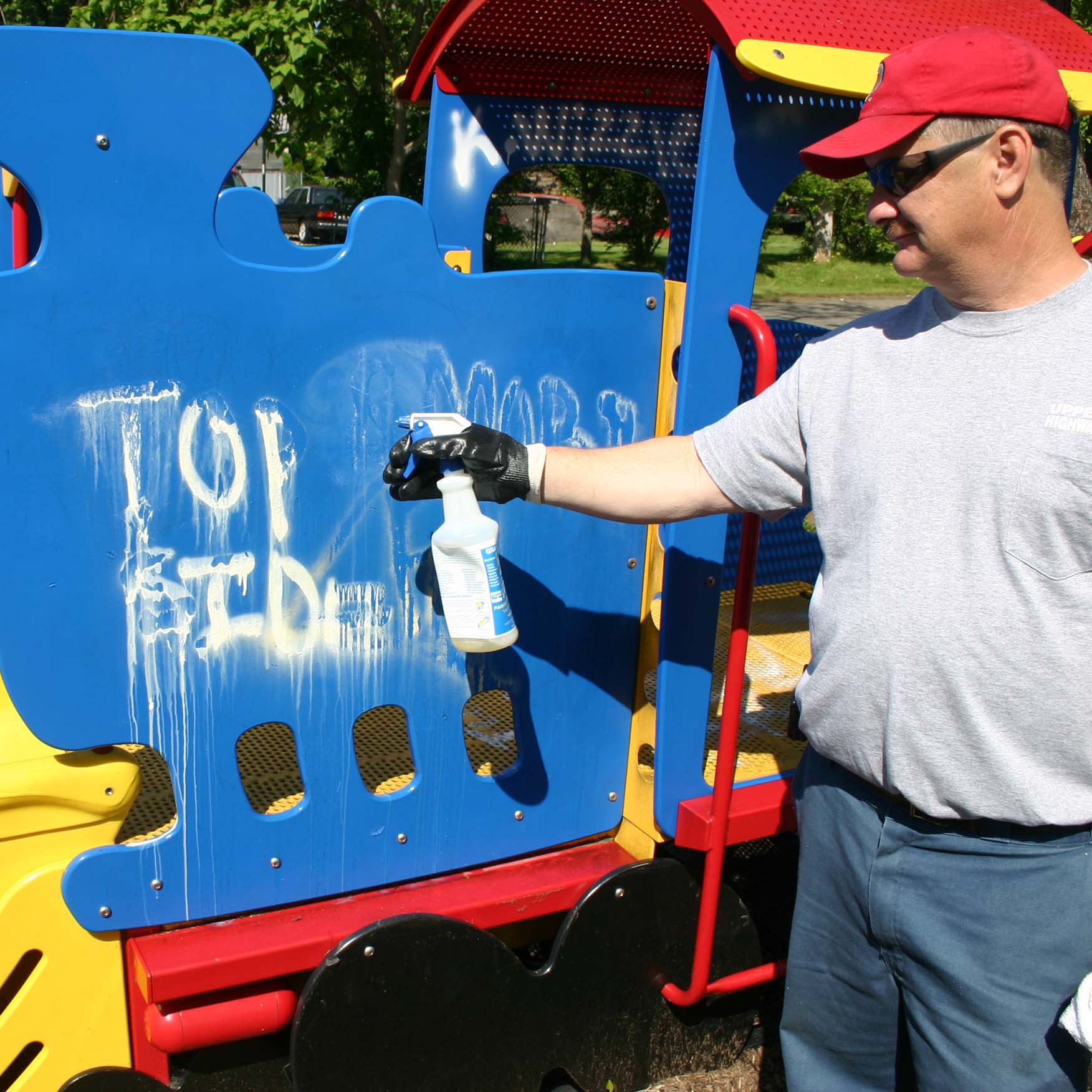 Graffiti Spray Remover Tagaway being applied to school playground